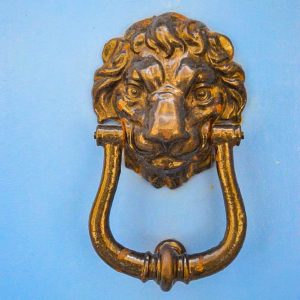 Golden lion doorknob in Valletta