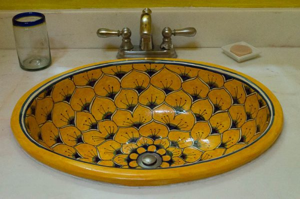 Yellow sink in a hotel in Mérida Mexico